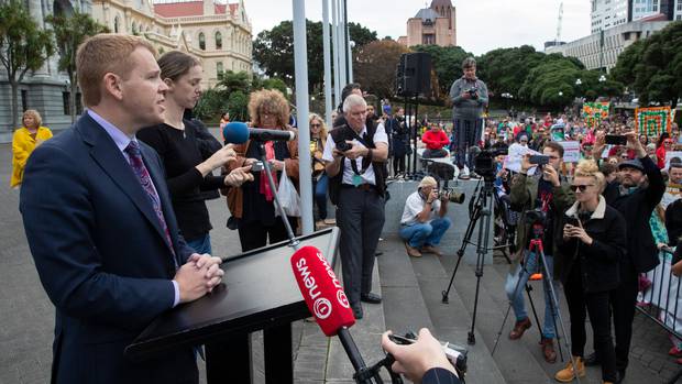 Education Minister Chris Hipkins fronting thousands of striking teachers, and their supporters,...