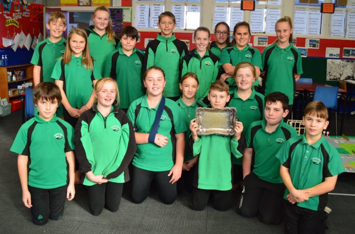 Seeking information on the mystery tray recently sent to Maheno School are pupils (back, from...