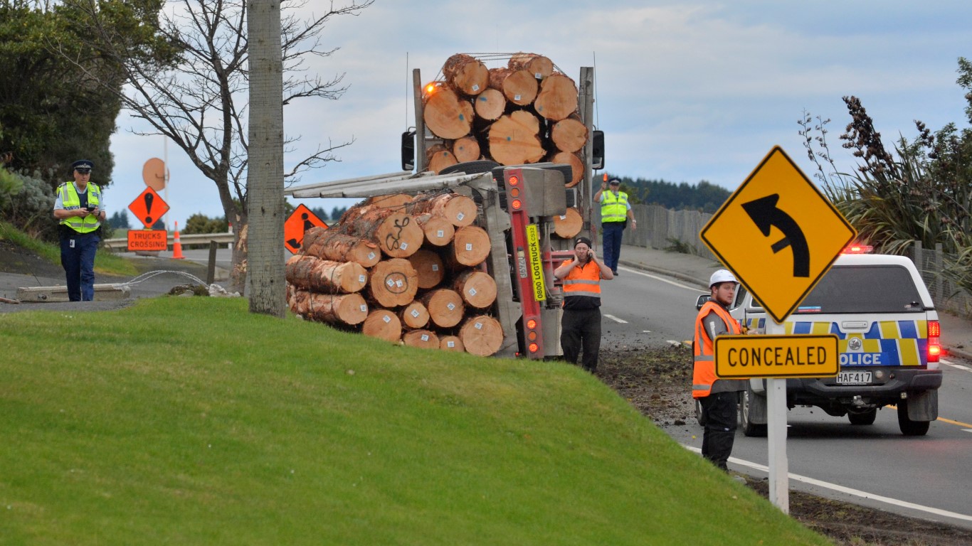 Police at the scene of an accident involving a logging truck at Maia this morning. Photo: Gerard...