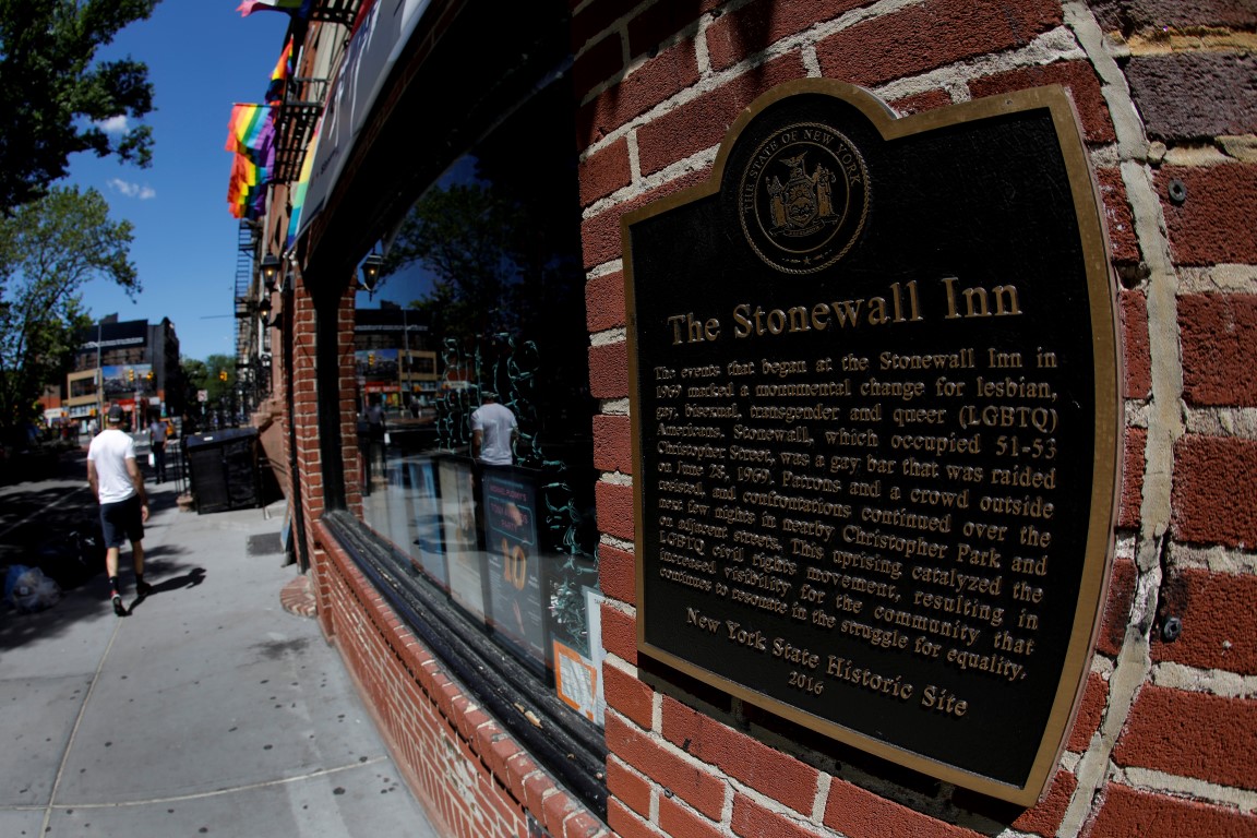 A man walks past the Stonewall Inn, site of the1969 Stonewall uprising, in Greenwich Village in...