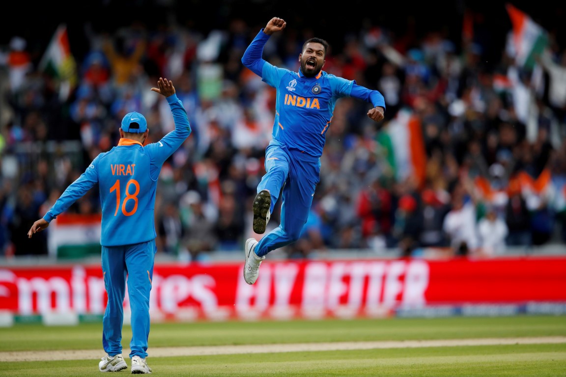 India's Hardik Pandya celebrates taking the wicket of Pakistan's Shoaib Malik. Photo: Reuters