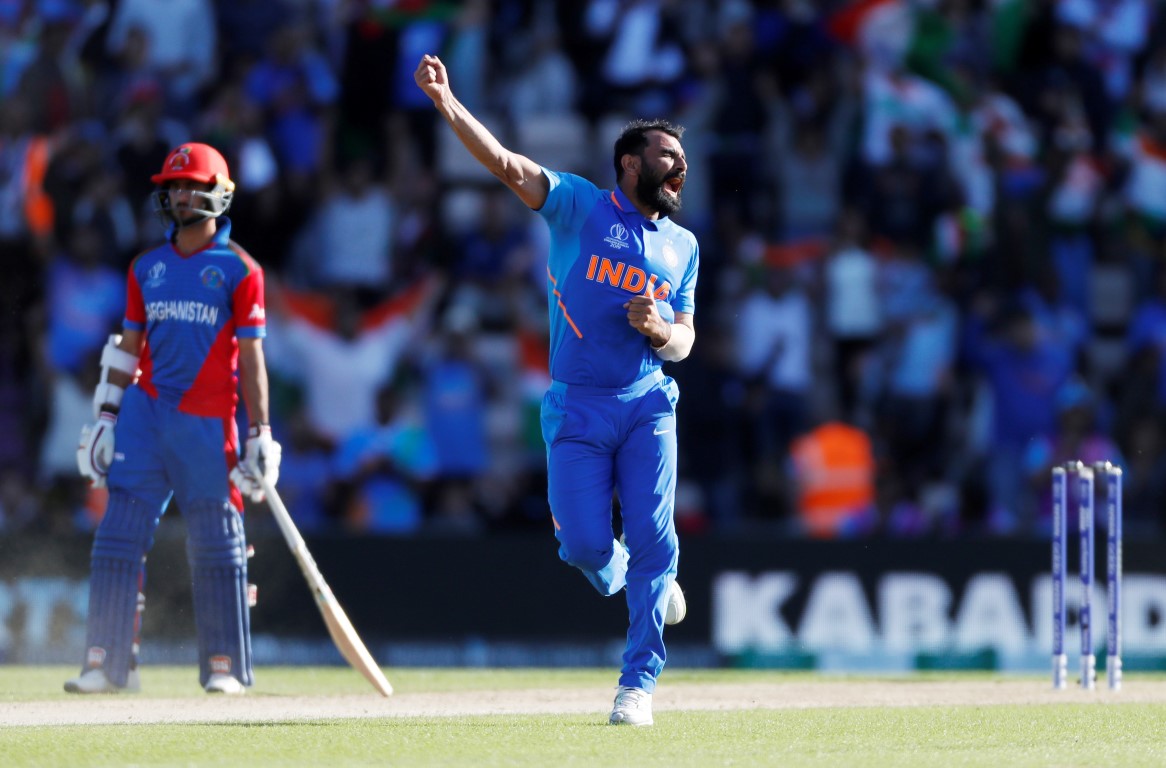 India's Mohammed Shami celebrates taking the wicket of Afghanistan's Aftab Alam. Photo: Reuters