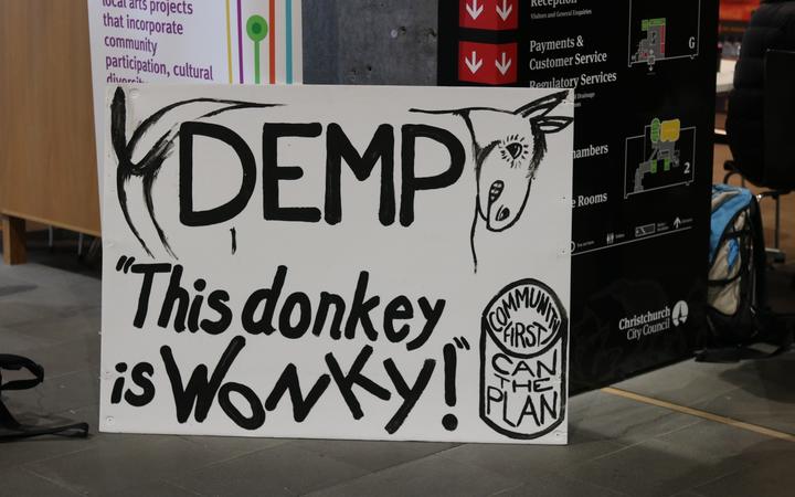 A placard set up by community members in protest over Christchurch's Downstream Effects...