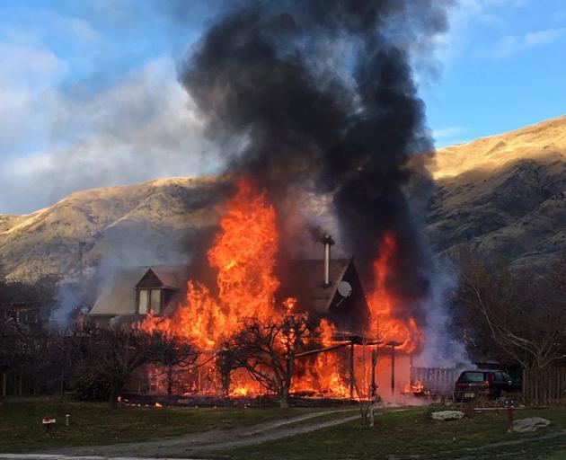 A house in Norman Tce was well alight before fire crews arrived on the scene. PHOTO: SANDRA CAMERON