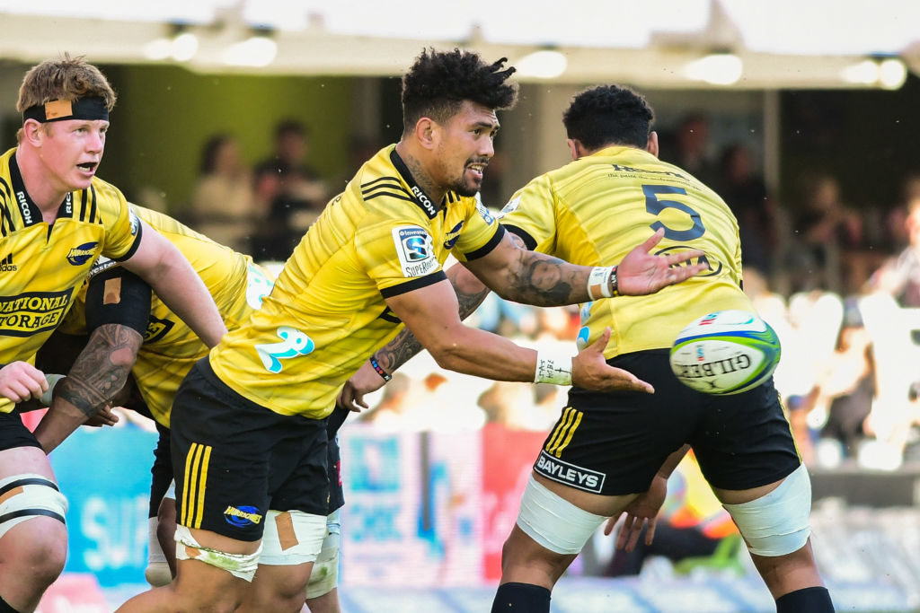 Ardie Savea of the Hurricanes gets a pass away against the Sharks. Photo: Getty