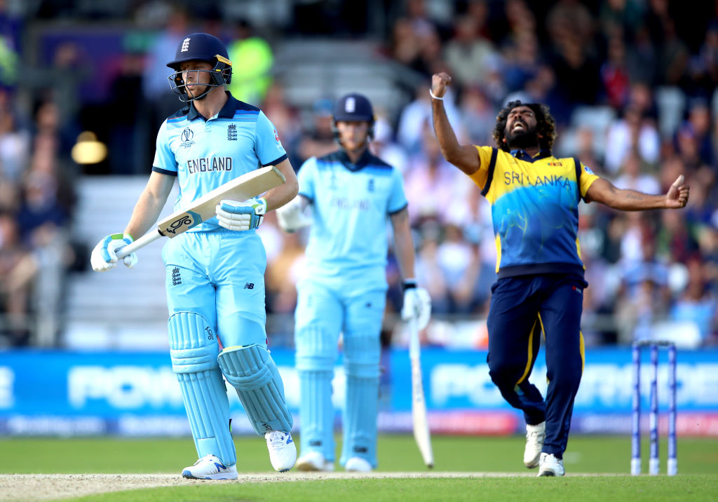 Sri Lanka's Lasith Malinga (R) celebrates the dismissal of England's Jos Buttler (L). Photo: PA...