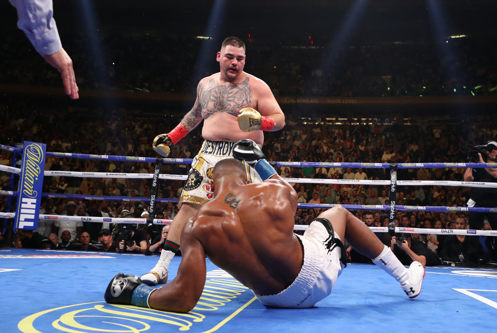 Andy Ruiz Jr knocks down Anthony Joshua during their IBF/WBA/WBO title fight at Madison Square...