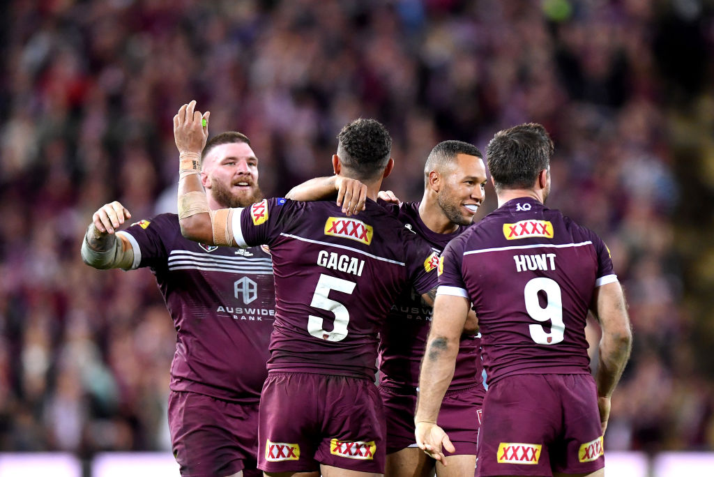 Queensland players celebrate their win over New South Wales Blues at Suncorp Stadium in Brisbane....