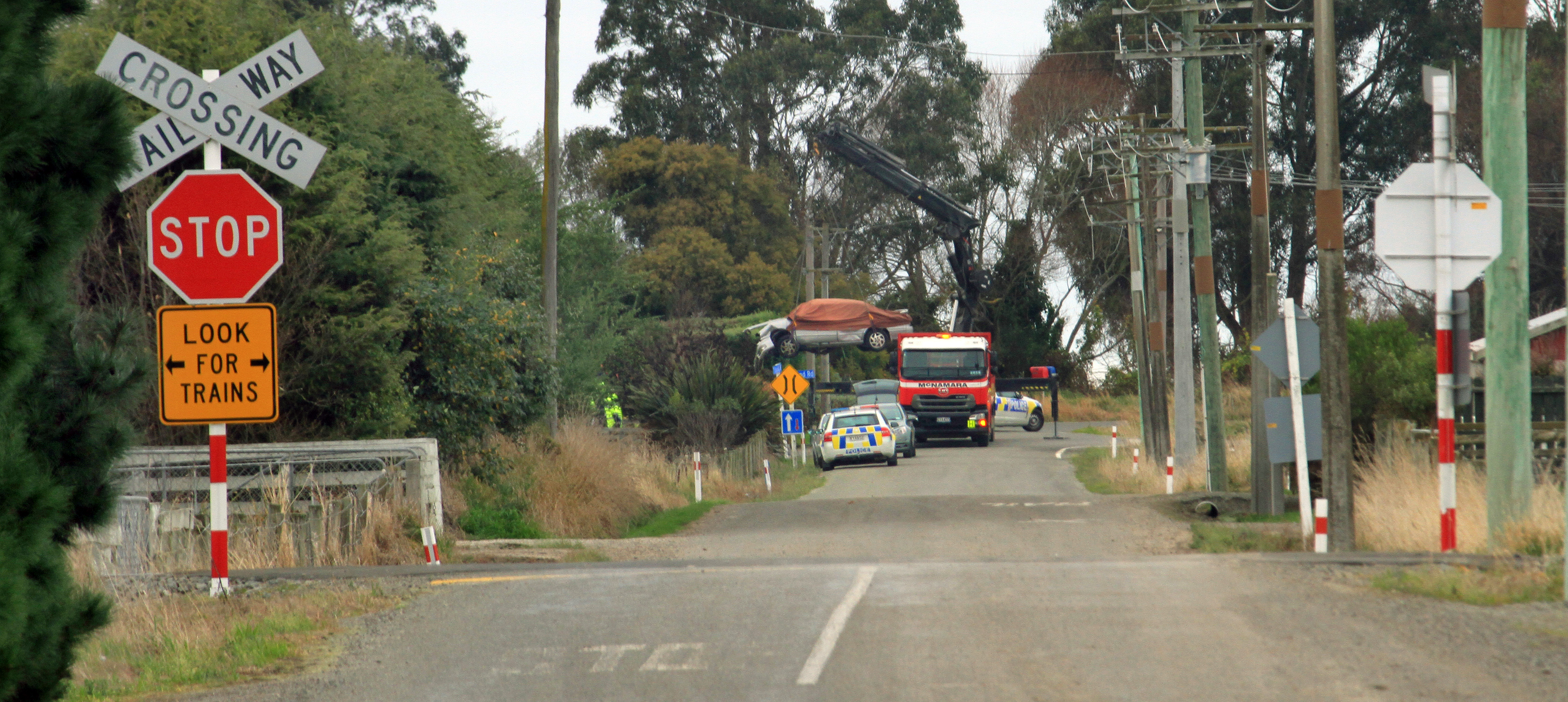 Police at the scene of the crash. PHOTO: HAMISH MACLEAN