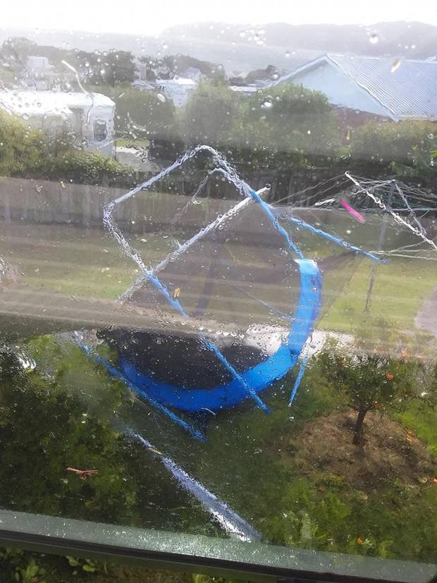 The high winds tore off roofs in Coopers beach and toppled trampolines. Photo: supplied