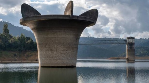 The spillway and valve tower at the Mangatangi Dam in the Hunua Ranges at the end of June,...