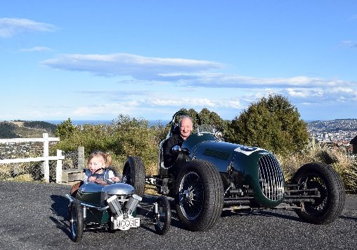 Jim Bennett and his great-granddaughter Arnikah Burke (3), of Dunedin, in an Impulse racing car...