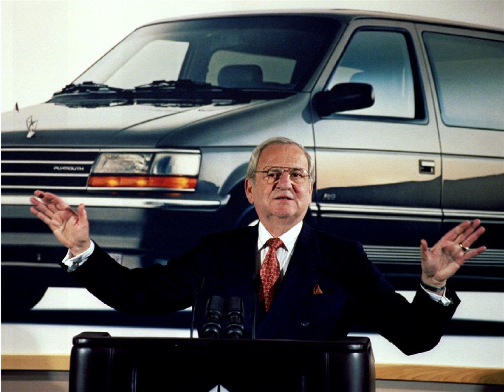 Lee Iacocca speaks at a Chrysler briefing on earnings in February 1991. Photo: Reuters