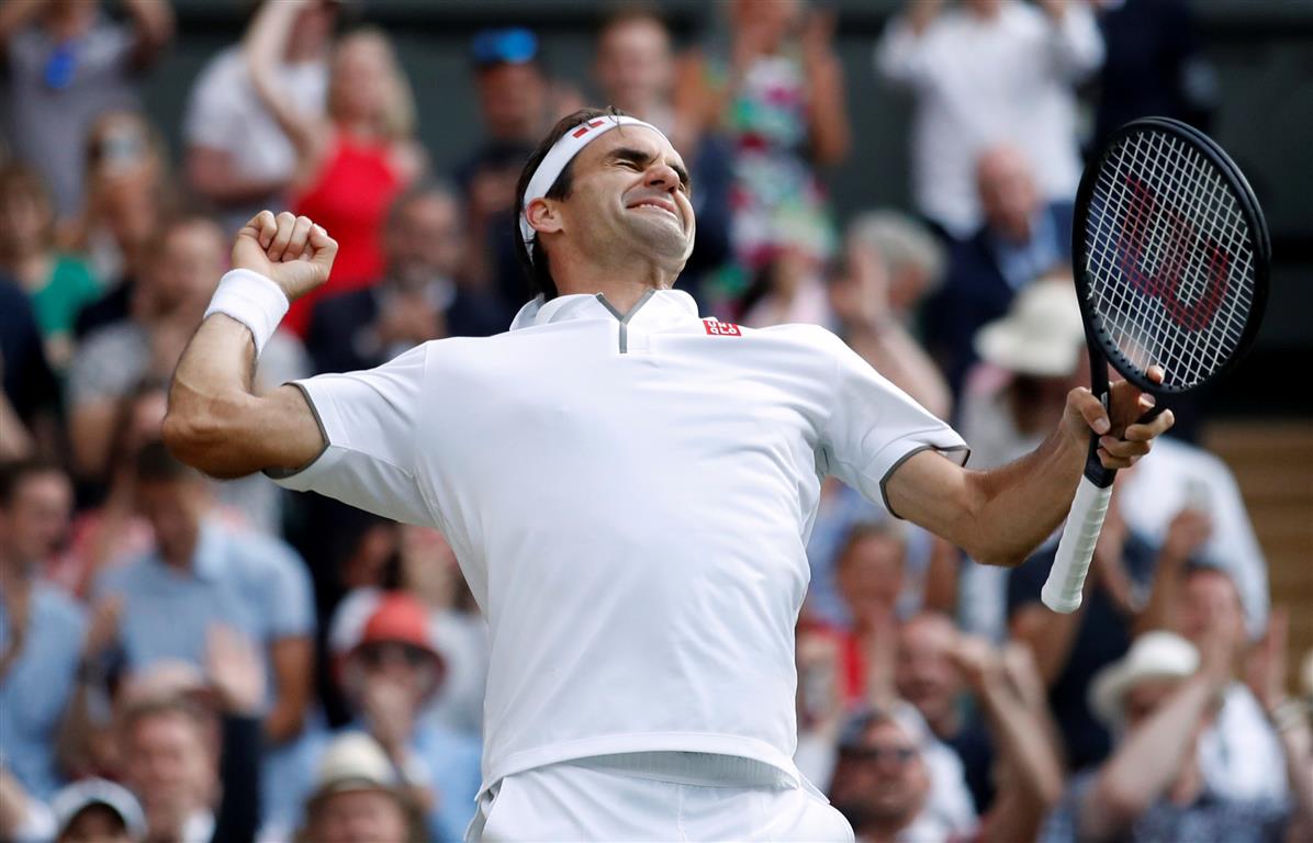 Roger Federer celebrates his win over Rafael Nadal. Photo: Reuters