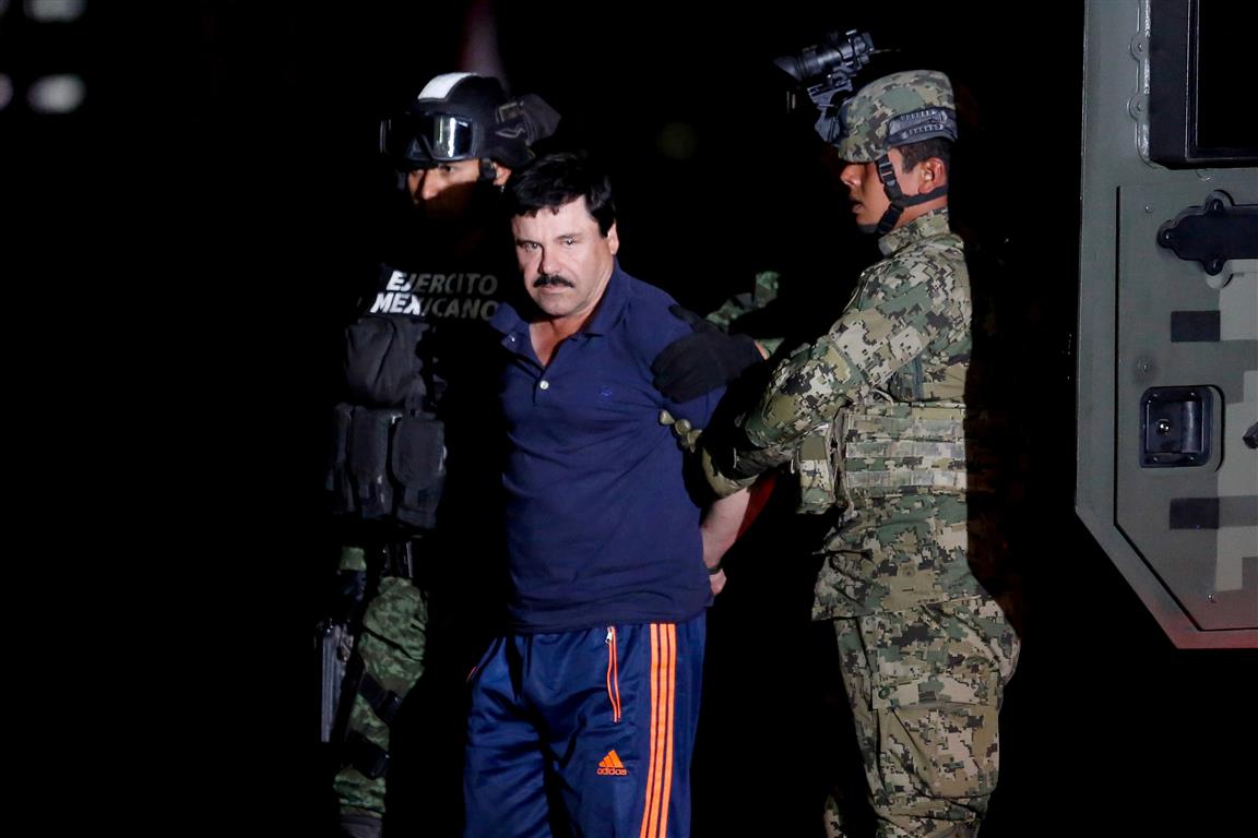 Joaquin "El Chapo" Guzman is escorted by soldiers in Mexico City in January 2016. Photo: Reuters