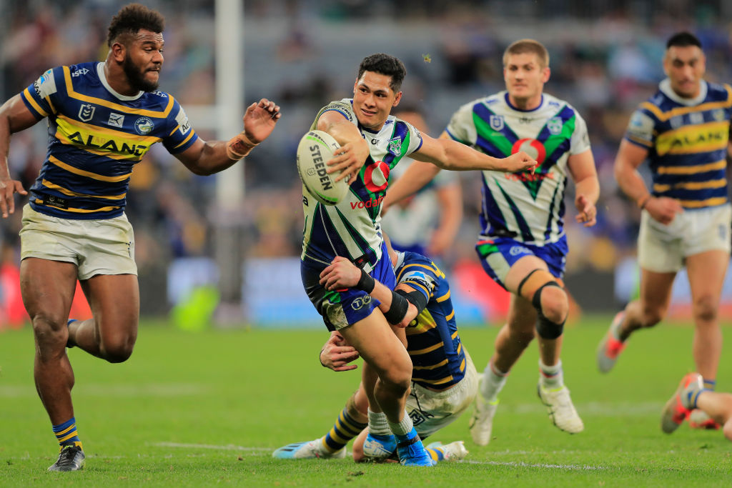 The Warriors' Roger Tuivasa-Sheck tries to offload the ball during the match against Parramatta....