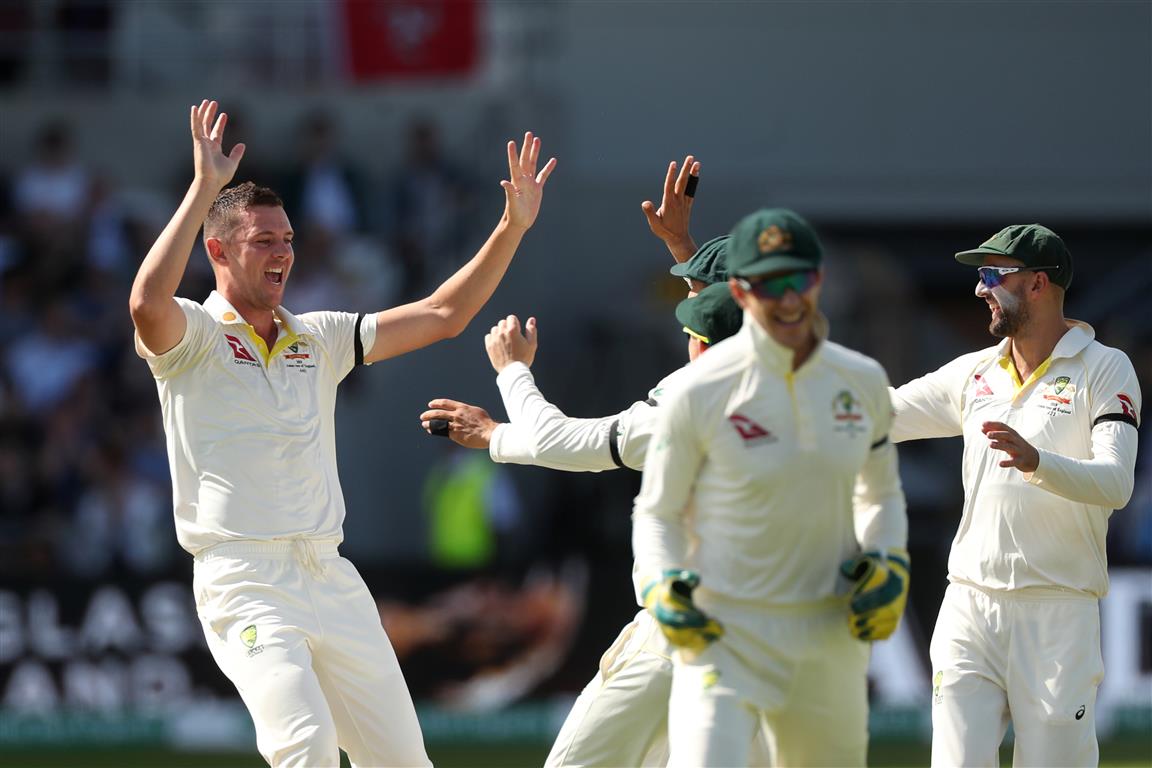 Australia's Josh Hazlewood celebrates taking the wicket of England's Joe Root. Photo: Reuters