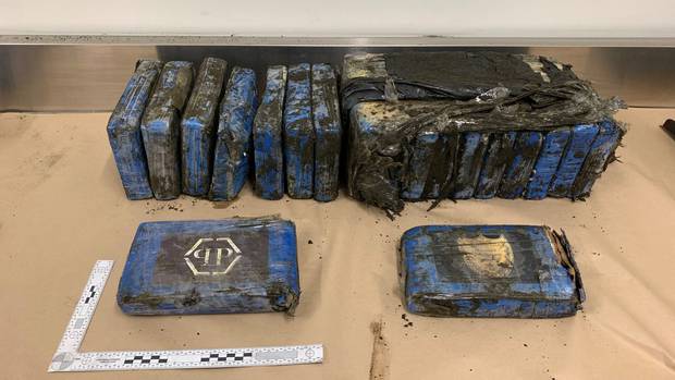 A number of packages that washed up on Bethells Beach. Photo: NZ Police