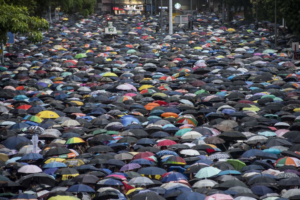 Thousands of demonstrators gather in the Victoria Park area during a protest in Hong Kong on...