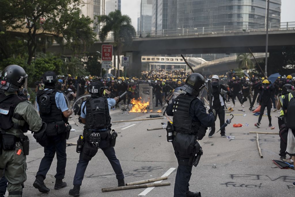 Police and protesters face off during a protest in Hong Kong on Saturday. Photo: Getty Images