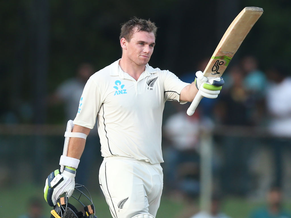 Tom Latham celebrates after reaching his century against Sri Lanka. 