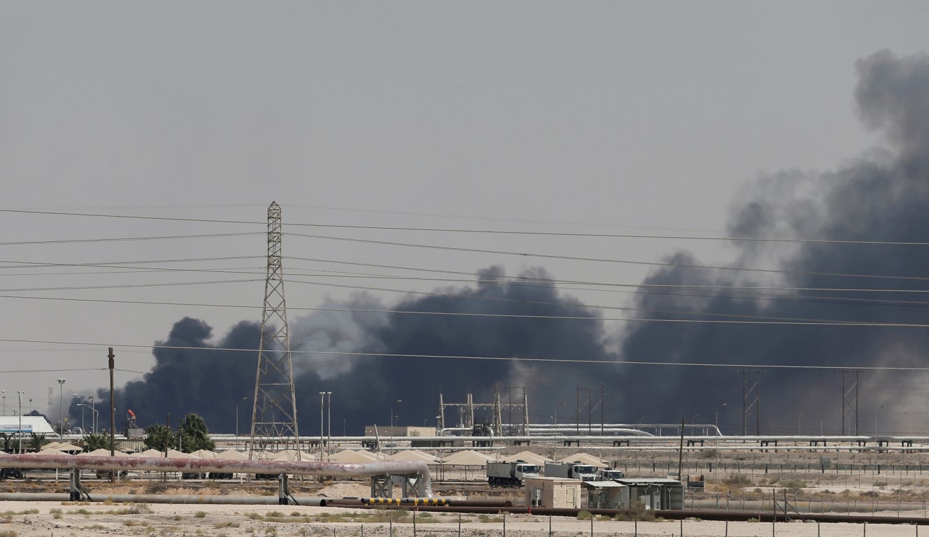 Smoke rises from a fire at the Aramco facility in the eastern city of Abqaiq following the attack...