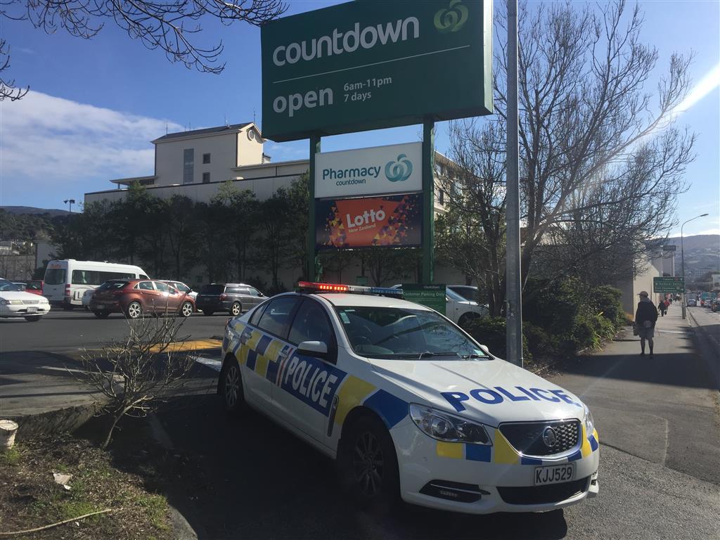 A police car blocks the entrance to Countdown supermarket. Photo: Gregor Richardson