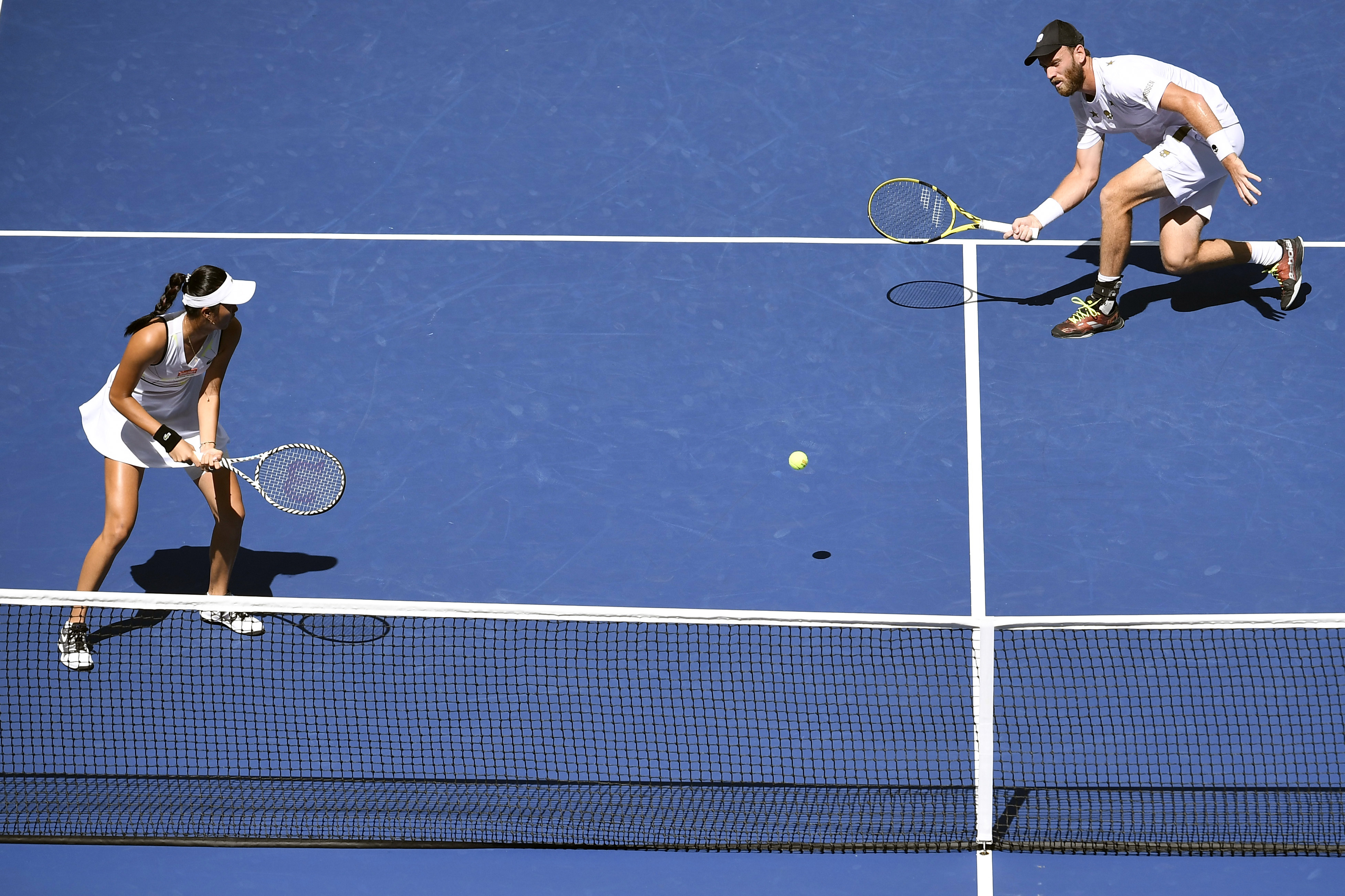 Michael Venus and Hao-Ching Chan during their Mixed doubles final match against Jamie Murray and Bethanie Mattek-Sands. Photo: Reuters