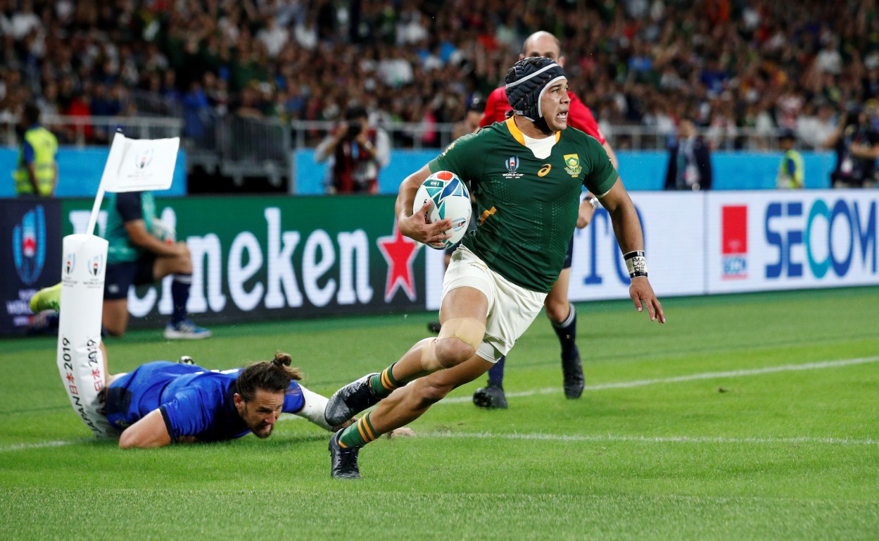 Cheslin Kolbe runs in to score a try for South Africa in their pool match against Italy. Photo:...