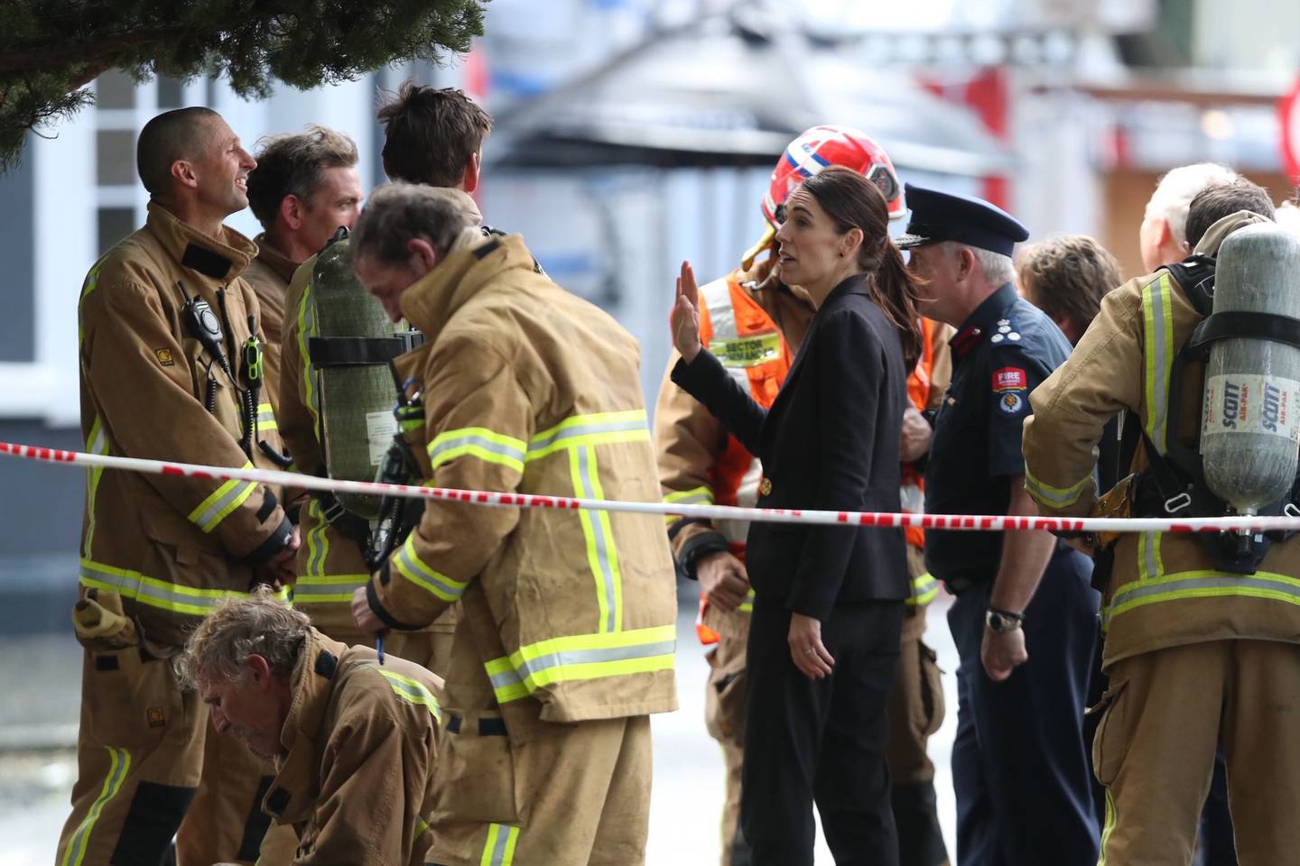 Prime Minister Jacinda Ardern meets firefighters battling the SkyCity blaze yesterday. Photo: NZ...