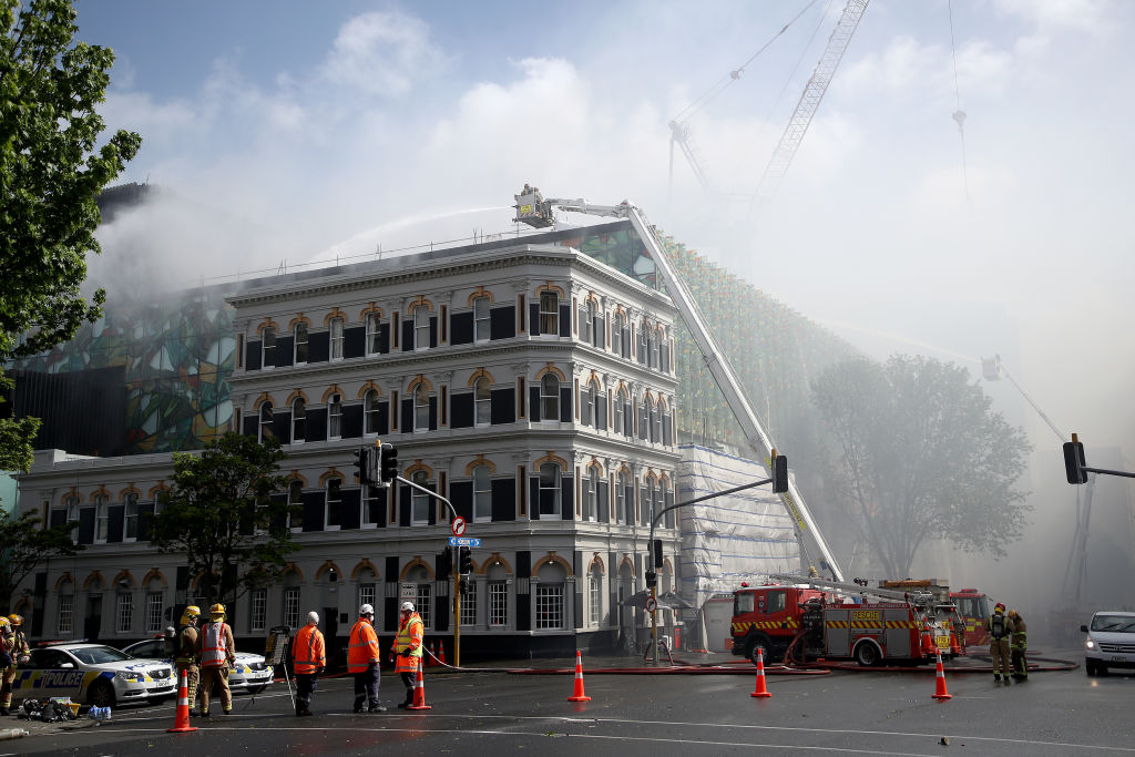 Firefighters are pumping an estimated 200 litres of water per second on the blaze. Photo: Getty