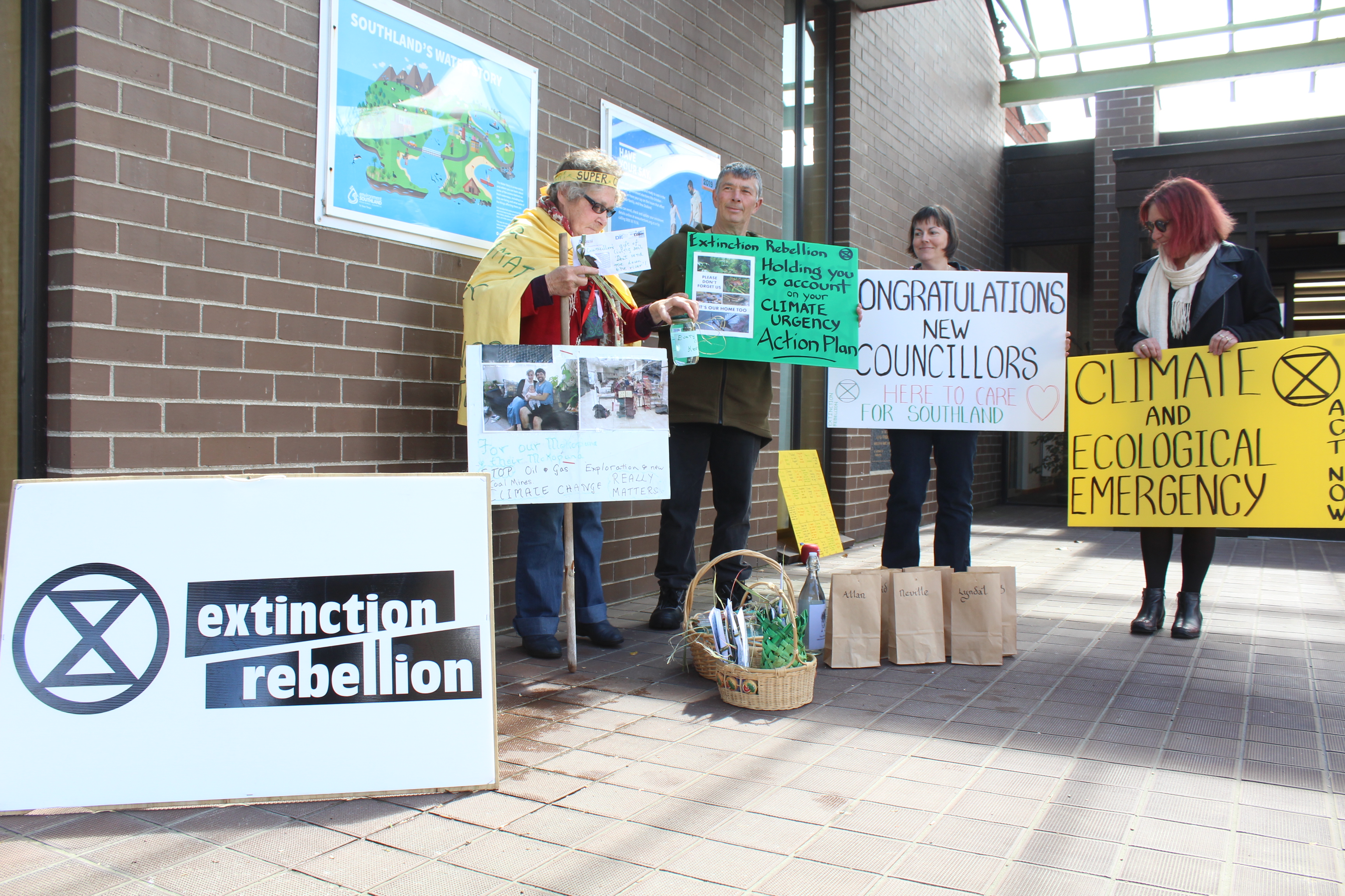 Councillors were greeted by the local Extinction Rebellion group in Invercargill as they made their way into the inaugural Environment Southland meeting yesterday. Photo: Laura Smith