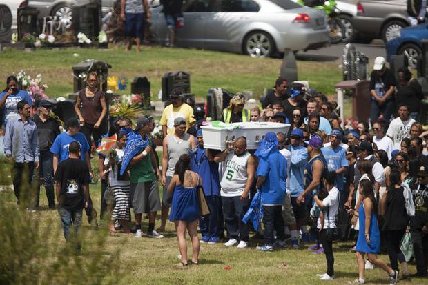 Sentry Taitoko is laid to rest in the Manukau Memorial Gardens by mourners after he died in...