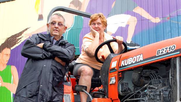 Mark and Pam Ottaway in Kaiwaka with their little Kubota tractor which was stolen and involved in...