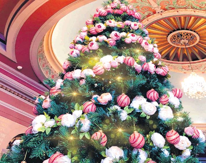 The Regent Theatre Christmas tree is bursting with colour, including 100 Hospice baubles. Photo:...