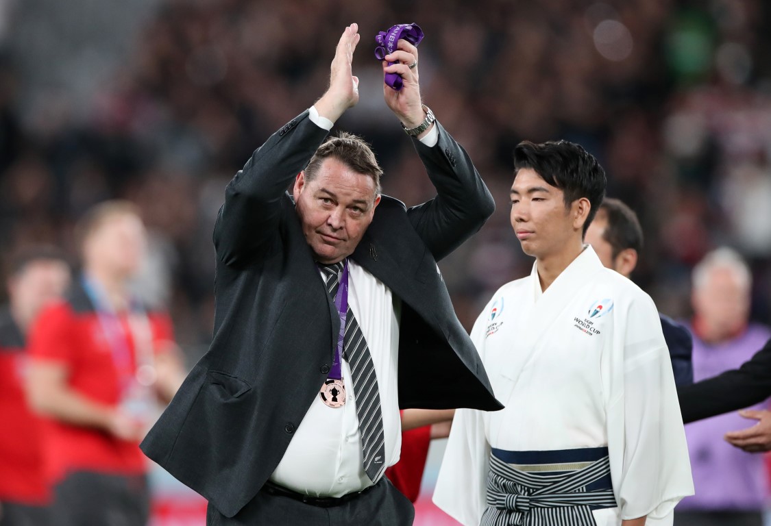 All Blacks head coach Steve Hansen acknowledges the crowd after receiving a bronze medal at the...