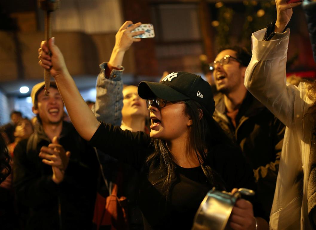 Demonstrators chant during a protest in Bogota. Photo: Reuters