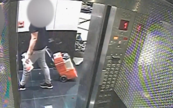 CCTV footage of the defendant in the Grace Millane murder trial with a rug doctor he hired. Photo...