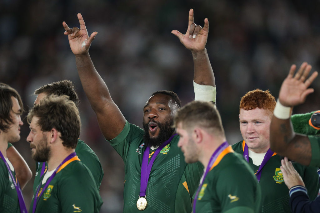 South Africa's Tendai Mtawarira celebrates with his winners medal after their Rugby World Cup...