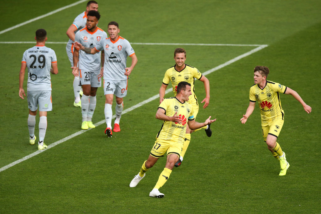 Steven Taylor (c) celebrates after scoring against the Brisbane Roar. Photo: Getty