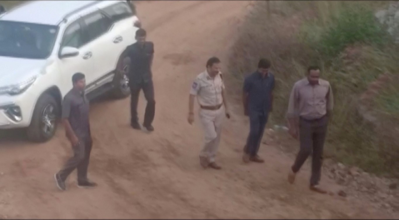 Police arrive at the scene of the shooting, in this still frame taken from video. Photo: Reuters