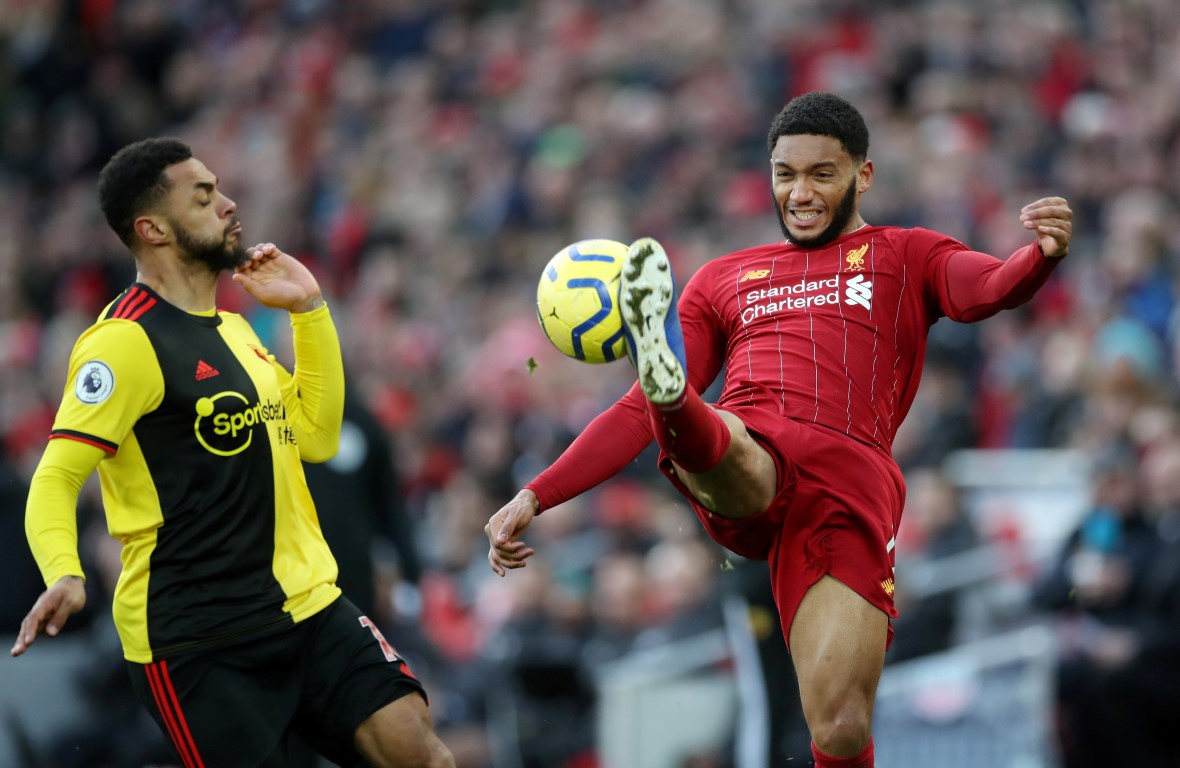 Liverpool's Joe Gomez in action with Watford's Andre Gray. Photo: Reuters