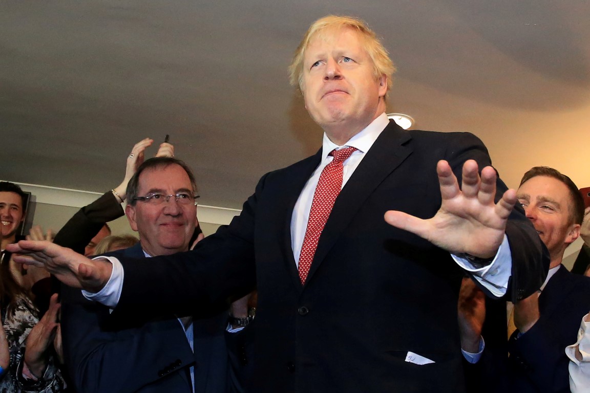 Boris Johnson speaks to supporters on a visit to meet newly elected Conservative party MP for...