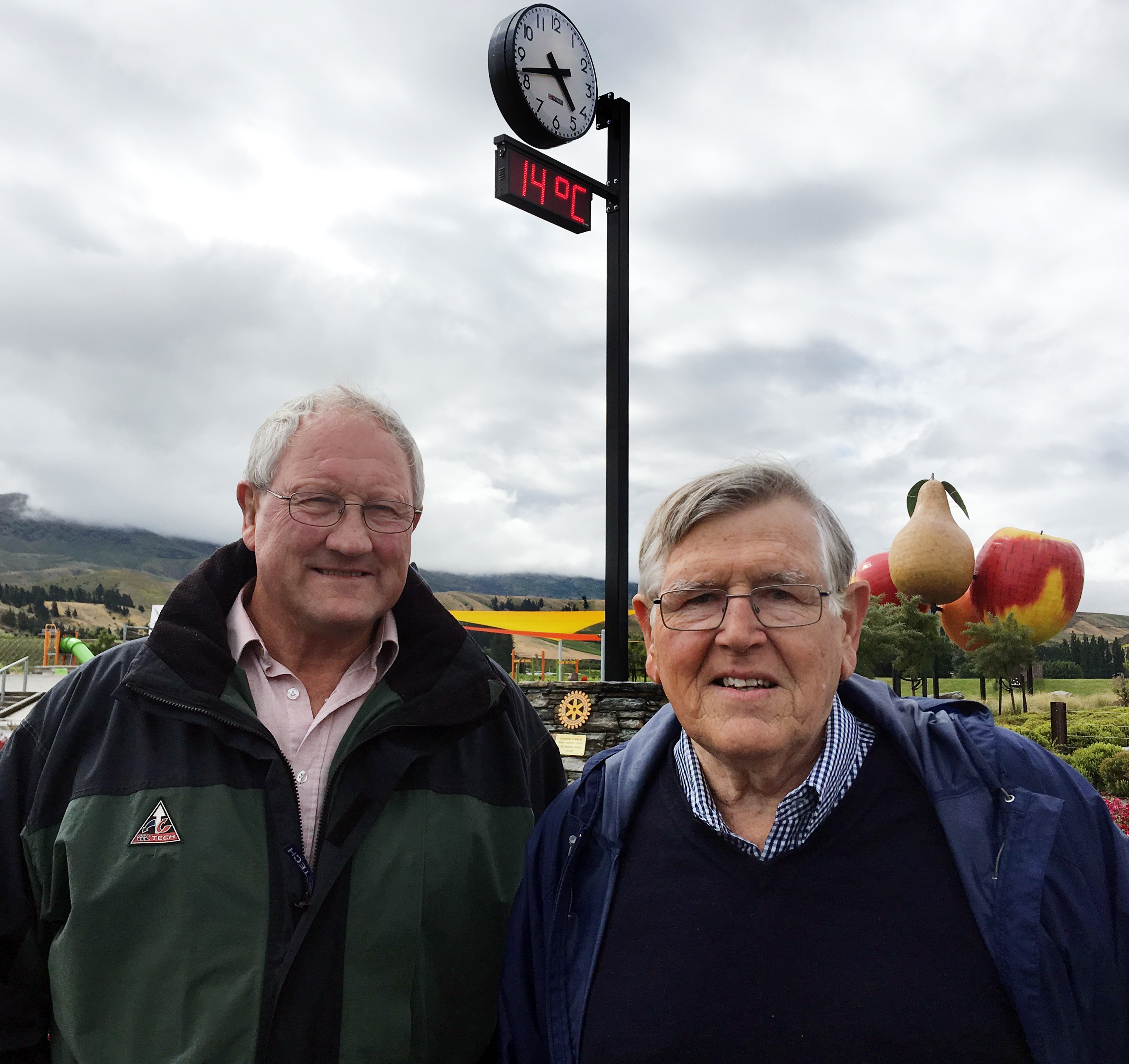 Cromwell Rotary Club members Fin White (left) and Andrew Burton unveil a new clock in Cromwell to...