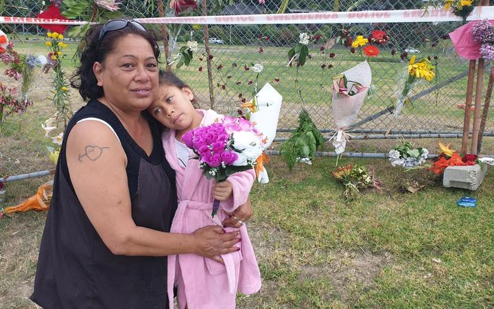 At the cordon in Whakatane, Katerina McLean, left, and Kymani Mihaka, 6, are supporting whānau...