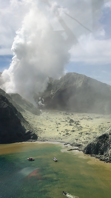 Boats got as close as they could to rescue survivors after the White Island eruption yesterday. Photo: Westpac Helicopter