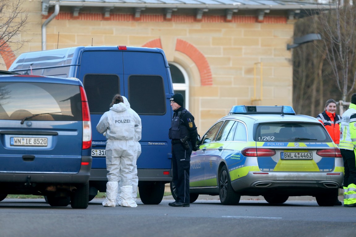 Forensic experts near the house in Rot am See where the shooting took place. Photo: Reuters 