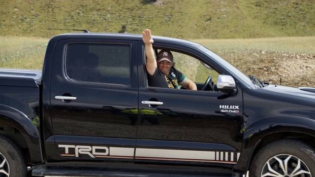 The man made the gesture at a group protesting the rodeo. Photo: Gabby Robinson