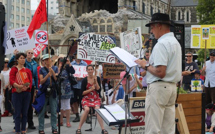 About 200 anti-5G protesters have swarmed central Christchurch with placards, hazmat suits and...