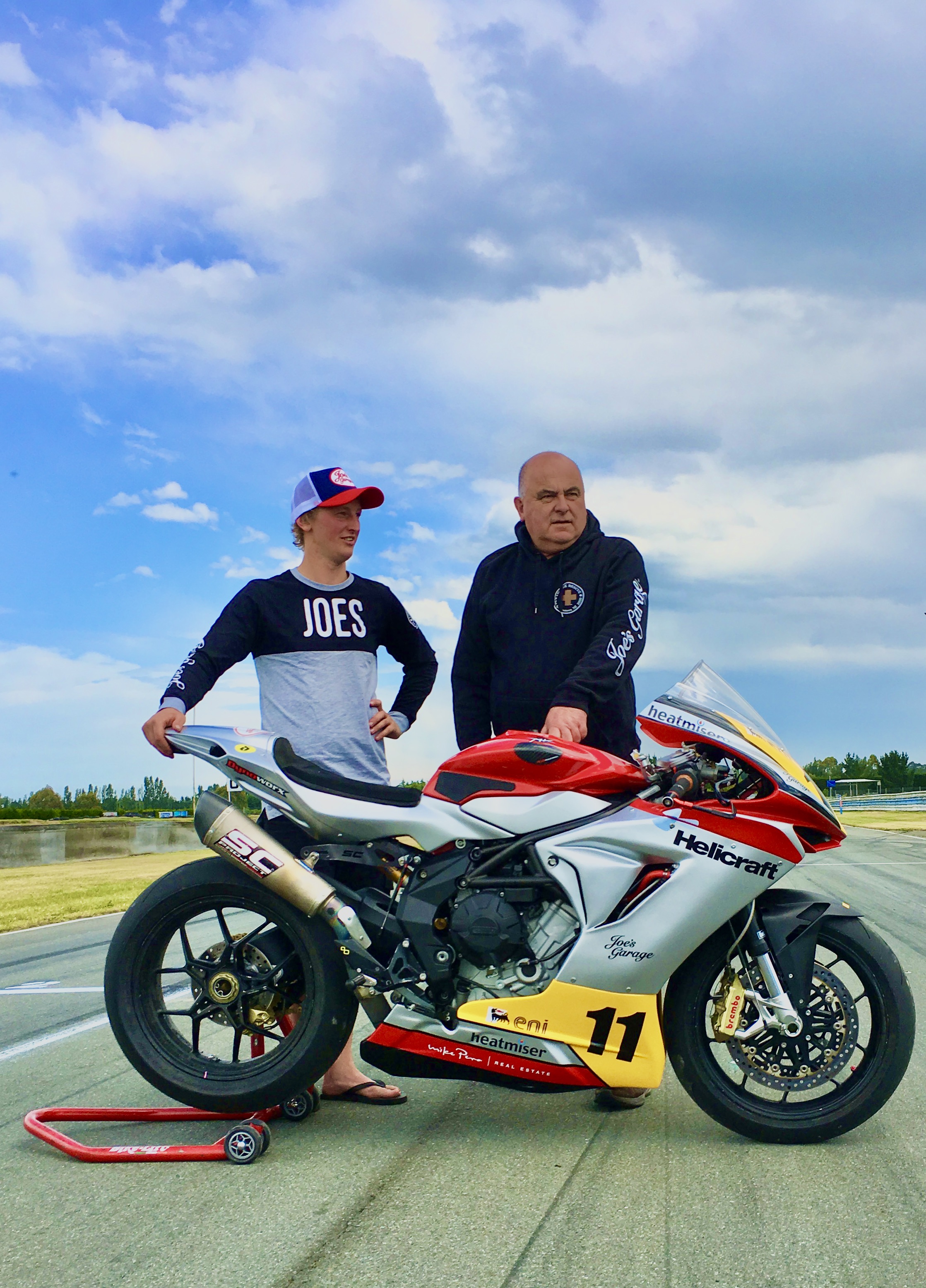 Rider Seth Devereux, of Tapanui (left), and Helicraft Racing owner Rod Price, of Wanaka, with the MV Agusta they will race in the 2020 New Zealand 600 Supersport Championship. Photo: Supplied